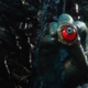A surreal scene from Phil Tippett's stop-motion film Mad God features a hand holding a red and green eyeball..